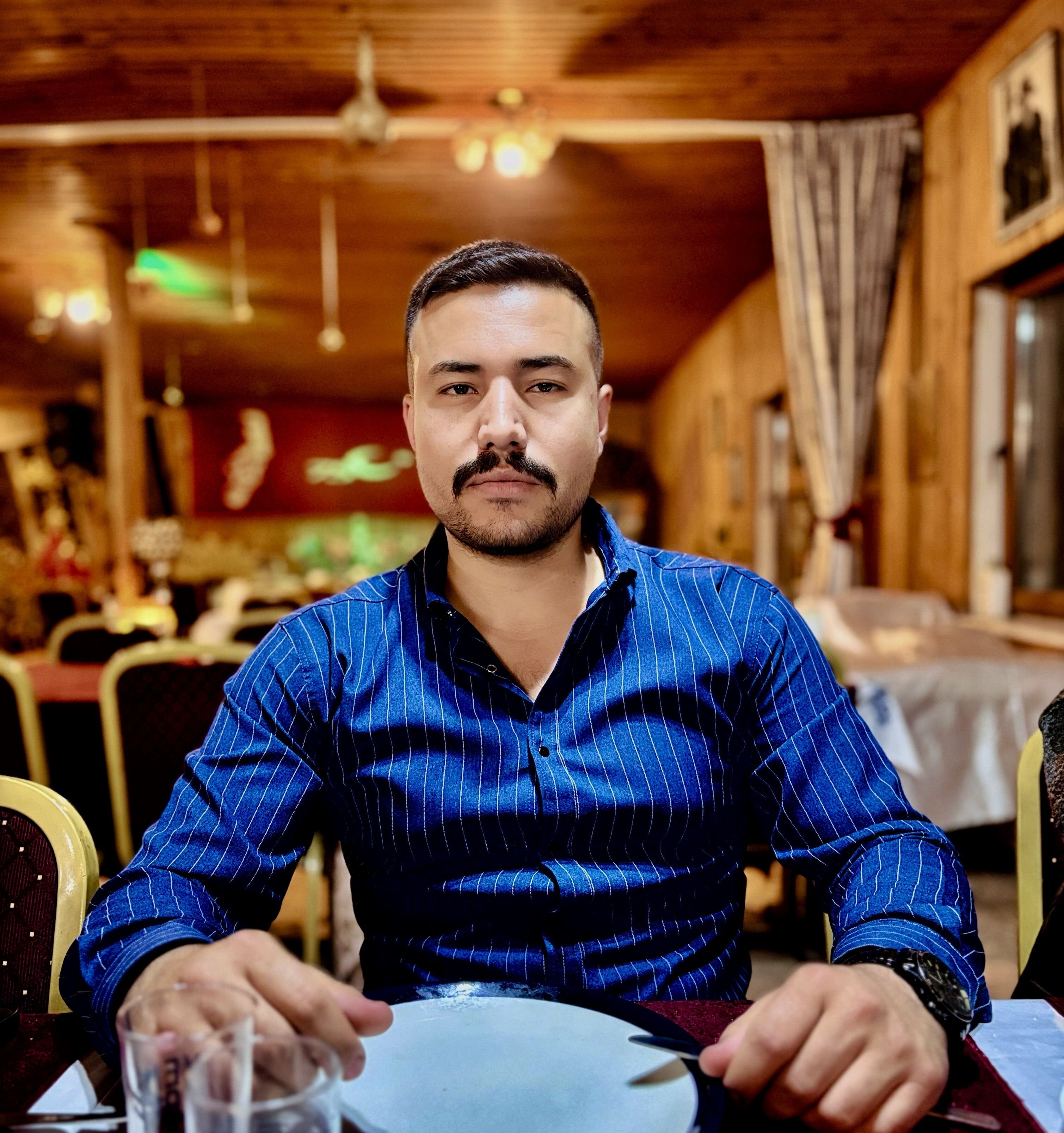 HÜSEYİN ÖZCAN